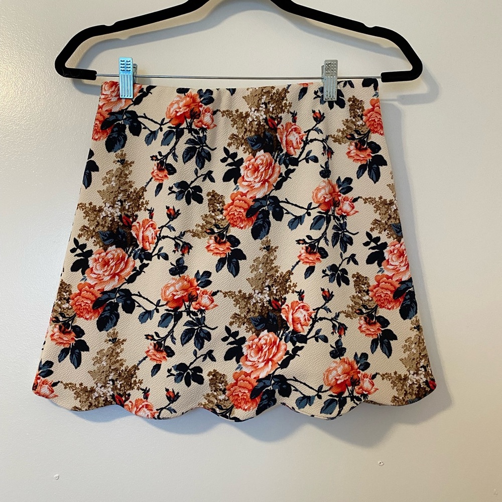 Lily White Mini Skirt with pink and blue flower detailing, size medium
